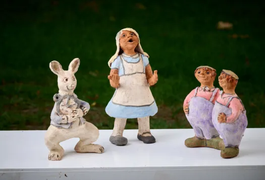 Alice and the White rabbit meet Tweedledum and Tweedledee by Meredith Plain