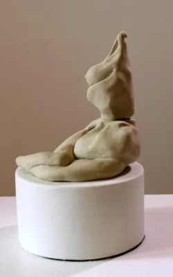 Figure Seated on Cylinder by Jude Bridges-Tull
