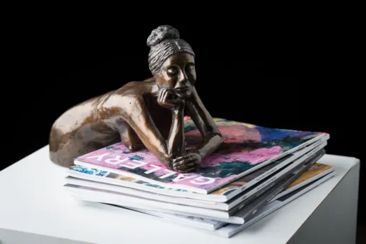 Girl on Books by Eva Ermer