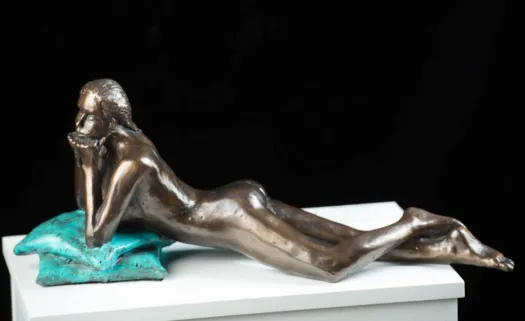 Girl on Cushions by Eva Ermer