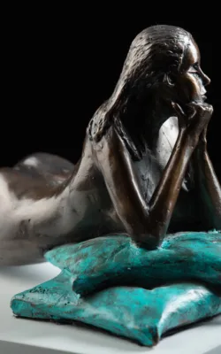 Girl on Cushions by Eva Ermer