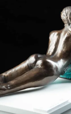 Girl on Cushions by Eva Ermer