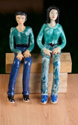 Man & Woman Sitting (Installation) by Eitan Froumine