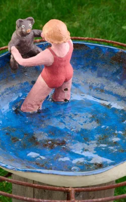 Teddy learns to swim. by Graham Duell