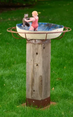 Teddy learns to swim. by Graham Duell